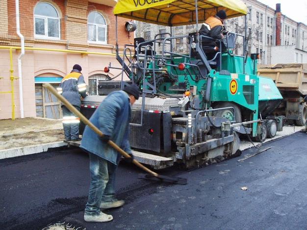Асфальтирование дороги в Омске